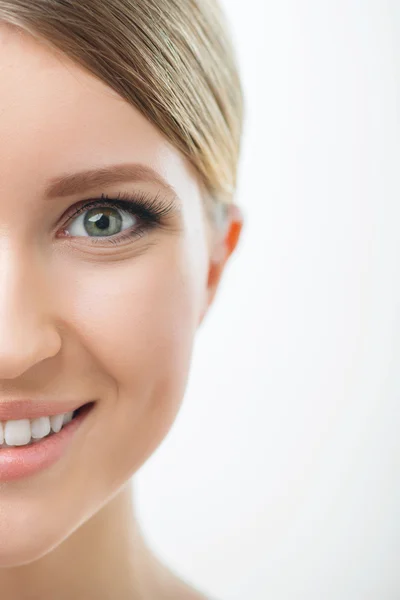 Attractive woman looking at you on white background — Stock Photo, Image