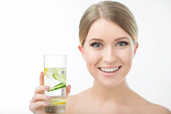 Pleasant woman holding glass of water — Stock Photo, Image
