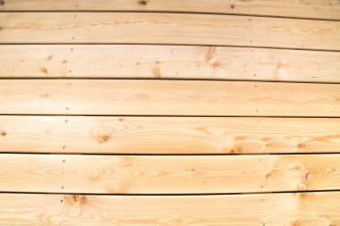 Parlak ahşap düğümlü kahverengi çam ağacından bir arka plan. Arkaplan, yapılar, tasarımlar.