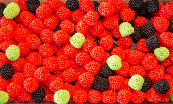 Ronde Marmelade Snoepjes Gerold Kruimels Van Verschillende Kleuren Een Stapel — Stockfoto