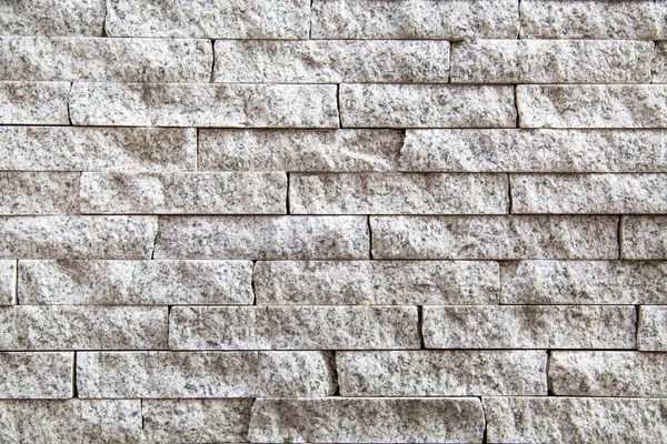 Der Hintergrund Der Wand Besteht Aus Streifen Aus Natürlichem Granit — Stockfoto