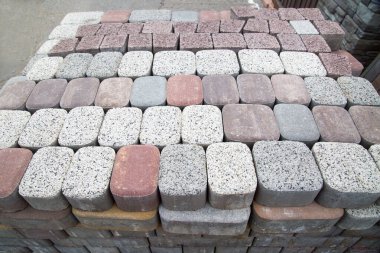 Bir yığın oval ve dikdörtgen kaldırım taşları açık leylak, bej renkli. Duvar kağıdı grafik tasarımı için doku arkaplanı.