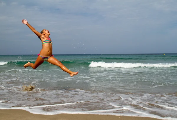 Jump on the beach — Stock Photo, Image