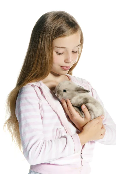 Happy little girl with rabbit — Stock Photo, Image