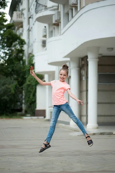 Happy Smiling Little Girl Fruit Ice Cream Jumps City Portrait — Stock Photo, Image