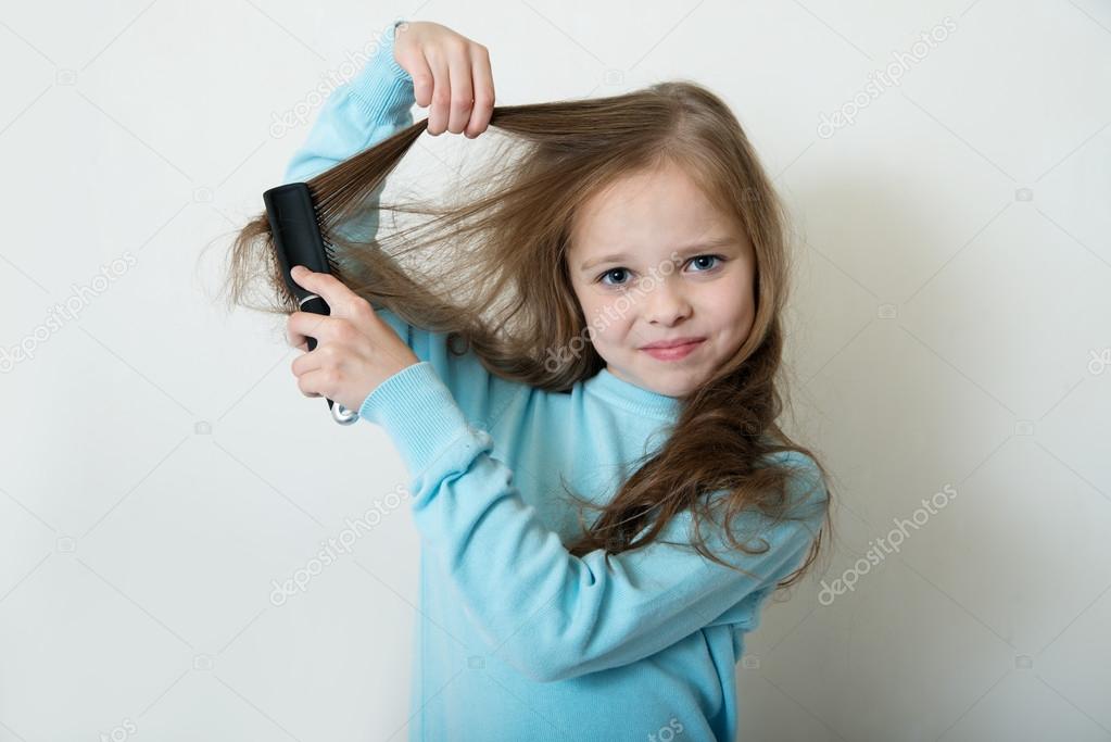 Little girl combing her hair Stock Photo by ©jutar 65465287 Little girl combing her hair Stock Photo by ©jutar 65465287