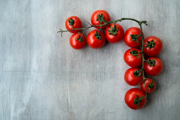 Canto de tomates deliciosos vermelhos frescos — Fotografia de Stock