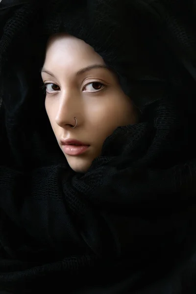 Girl with perfect skin in a black scarf — Stock Photo, Image