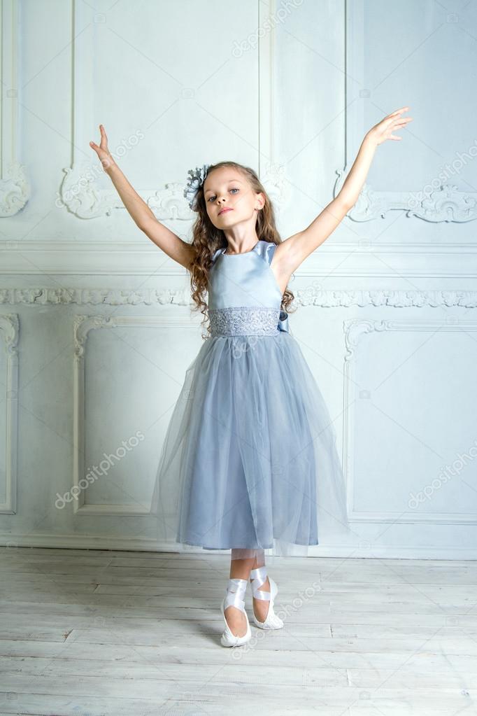 A little adorable young ballerina