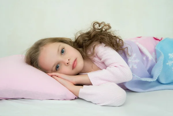 Adorable little girl sleeping in her bed — Stock Photo, Image