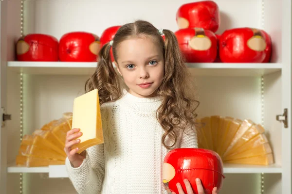 Little girl with cheese — Stock Photo, Image