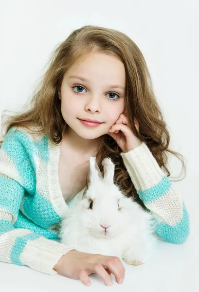 Happy little girl with rabbit — Stock Photo, Image