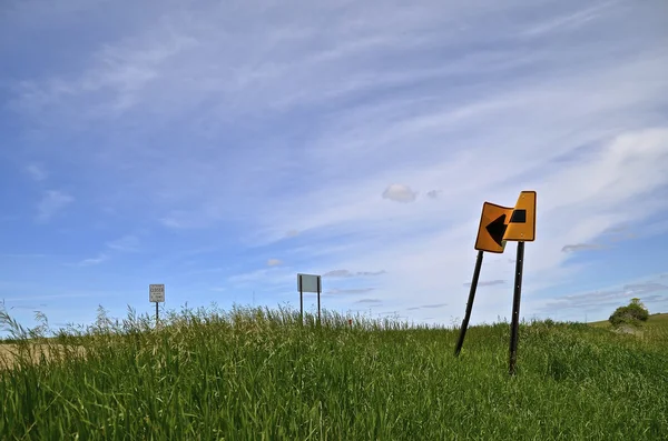 Crumpled road sign — Stock Photo, Image