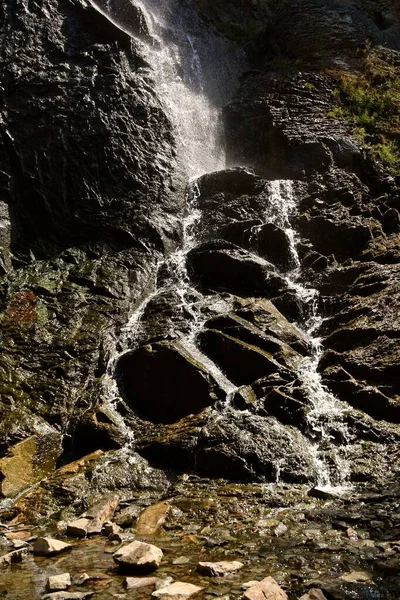 Water spraying over the rocks of a waterfalls in the Black Hills  of South Dakota.