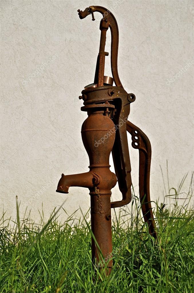 Old antique hand water pump — Stock 