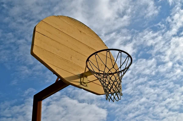 Wooden backboard, hoop, and net Stock Image