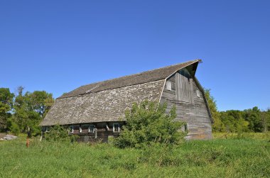 Rickety old deteriorated barn in a state of disrepair