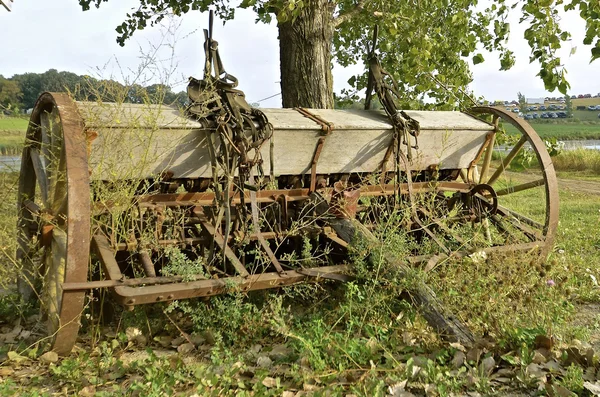 Old time seed grill with seed box — Stock Photo, Image