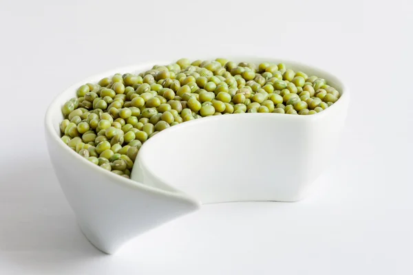 Beans in white ceramics bowl — Stock Photo, Image