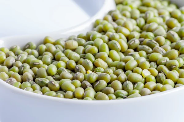 Beans in white ceramics bowl — Stock Photo, Image