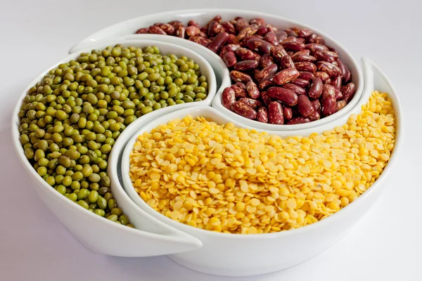 Multicolored beans in bowl — Stock Photo, Image