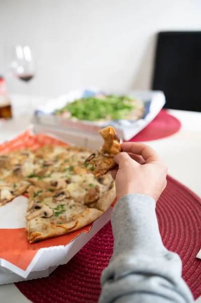 Eating food at home, pizza at home with the best company.Delivery food concept