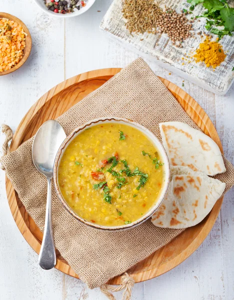 Lentil soup with bread in a ceramic white bowl Top view — Stock Image Lentil soup with bread in a ceramic white bowl Top view Royalty Free Stock Images