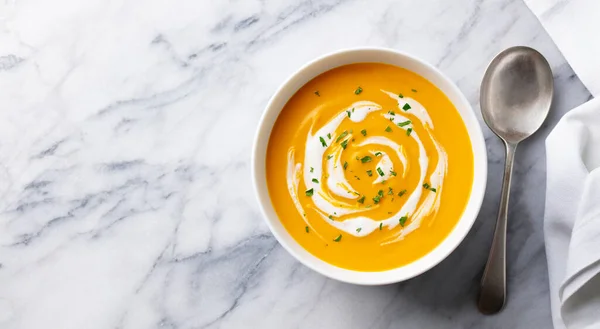 Pumpkin soup with cream. Marble background. Copy space. Top view. — Stock Image Pumpkin soup with cream. Marble background. Copy space. Top view. Royalty Free Stock Photos