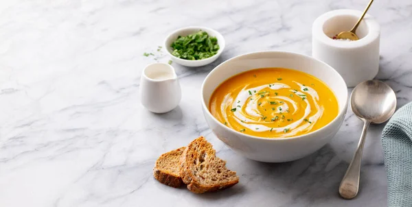 Pumpkin soup with cream. Marble background. Copy space. — Stock Image Pumpkin soup with cream. Marble background. Copy space. Royalty Free Stock Photos