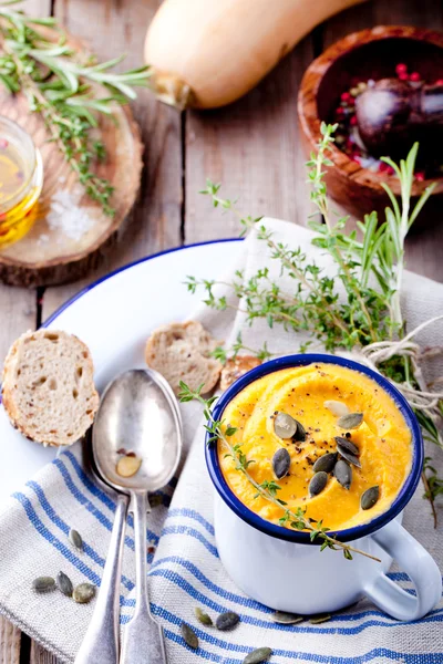 Roasted pumpkin and carrot soup with cream . — Stock Image Roasted pumpkin and carrot soup with cream . Stock Image
