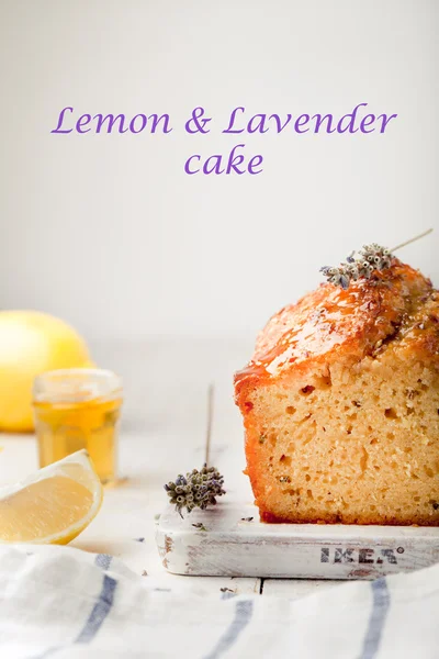 Lavender, lemon cake with fresh lemons and lavender flowers