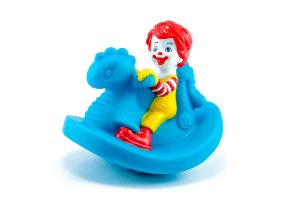 Toddler ronald toy dragon riding — Stock Photo, Image