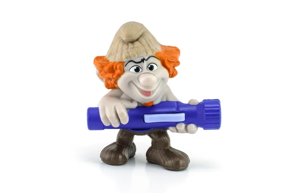 Hackus hold a flash light this is character from the smurf 2 — Stock Photo, Image