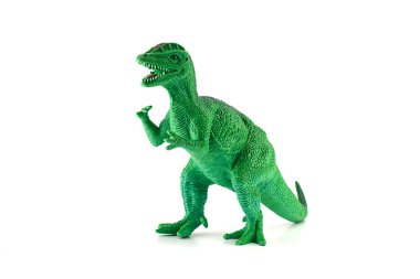 Beyaz izole yeşil Dilophosaurus dinozor oyuncak figür.