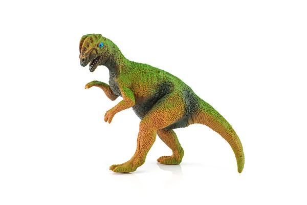 Figura de juguete de dinosaurio Dilophosaurus aislada en blanco . —  Fotos de Stock