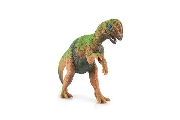 Beyaz izole Dilophosaurus dinozor oyuncak figür. — Stok fotoğraf