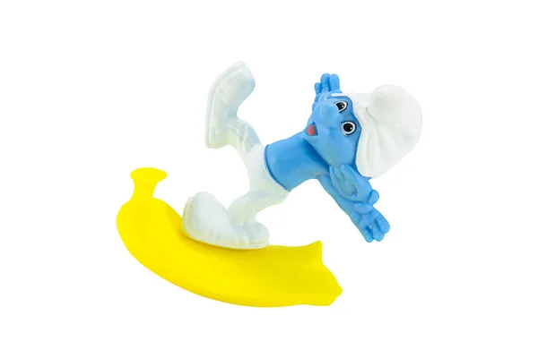 Desajeitado smurf deslizamento em uma casca de banana — Fotografia de Stock