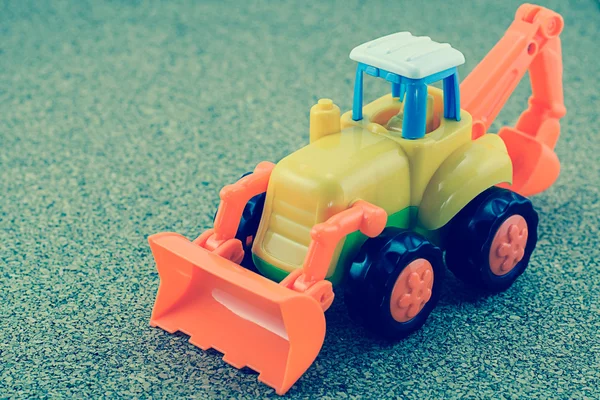 Vintage styl traktor bagr hračka — Stock fotografie