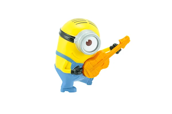 Minions playing a guitar toy character — Stock Photo, Image