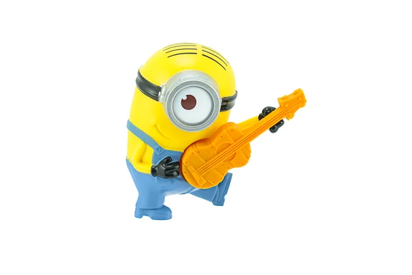 Minions jugando un personaje de juguete de guitarra — Foto de Stock