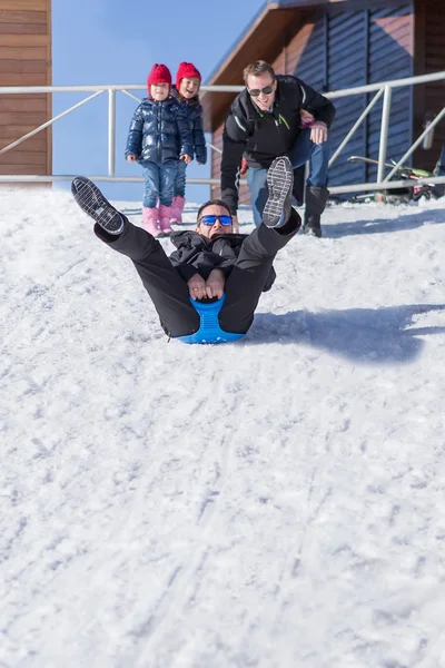 Adult man riding sledge — Stock Photo, Image