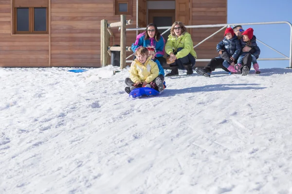 Two boys riding on sledge — Stock Photo, Image