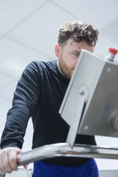 Man looking seriously at monitor — Stock Photo, Image