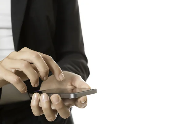 Hands of business woman using a mobile phone — Stock Photo, Image