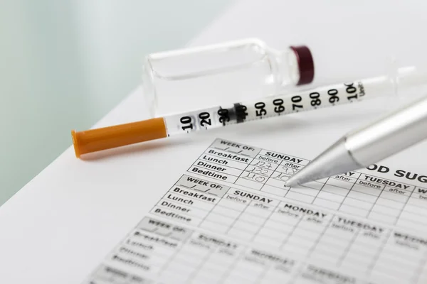 Filling in the blood glucose diary — Stock Photo, Image