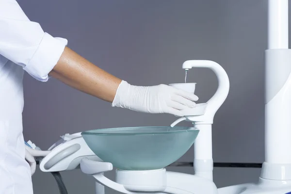 Filling a plastic cup — Stock Photo, Image