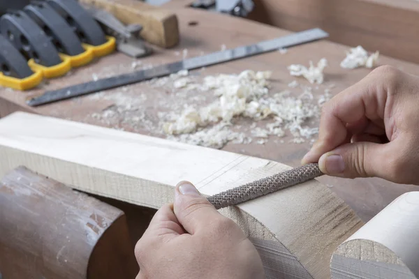 Luthier filing down — Stock Photo, Image