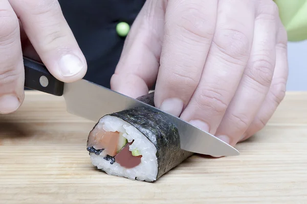 Knife and sushi — Stock Photo, Image