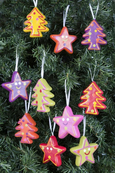 Christmas tree ornaments - trees and stars — Stock Photo, Image