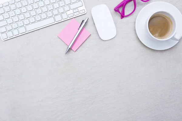 Business desk and a cup of coffee — Stock Photo, Image